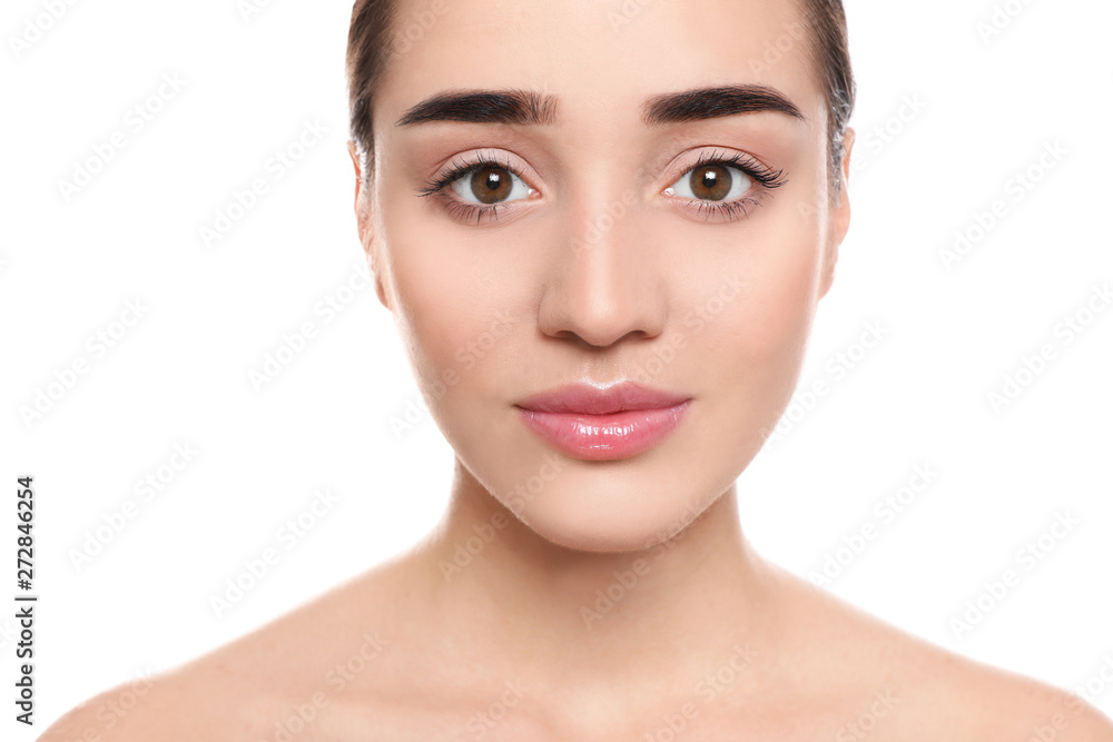 Portrait of young woman with beautiful face against white background Portrait of young woman with beautiful face against white background