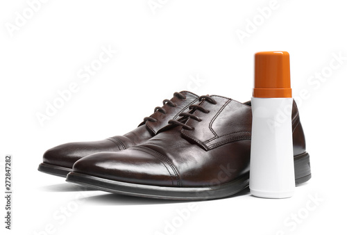 Stylish men's shoes and cream on white background