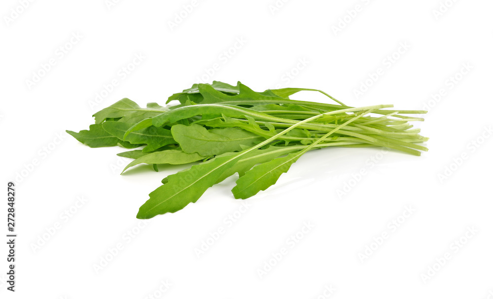 Sweet rucola salad or rocket lettuce leaves isolated on white background Sweet rucola salad or rocket lettuce leaves isolated on white background