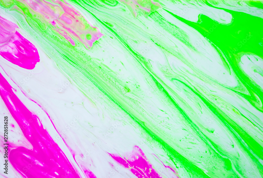 Abstract colorful painting background made in fluid art technique. Trendy pattern.
