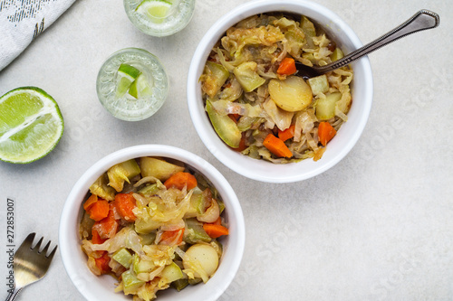 Vegetable stew of carrots, potatoes, cabbage and zucchini