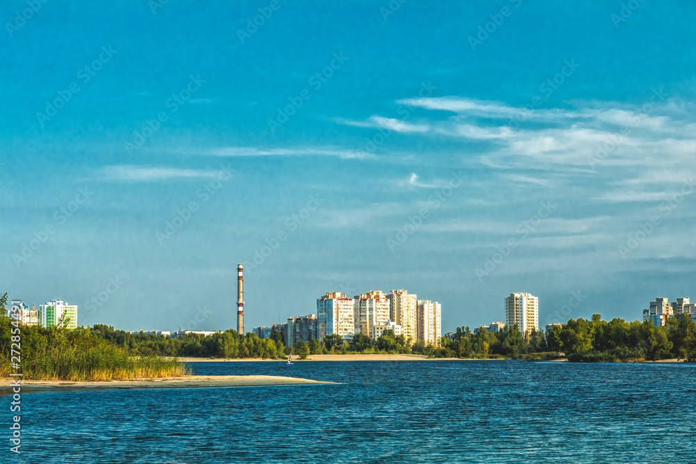 Cityscapes and skyline in clear blue sky on view from river