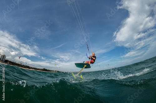 Surf rides Hydrofoilkite  photo