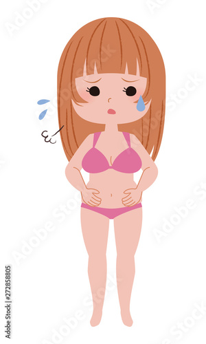 肥満に悩む水着姿の若い女性