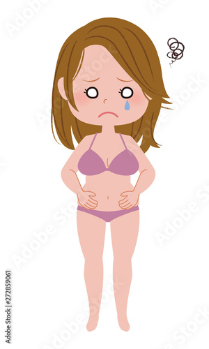 肥満に悩む水着姿の若い女性