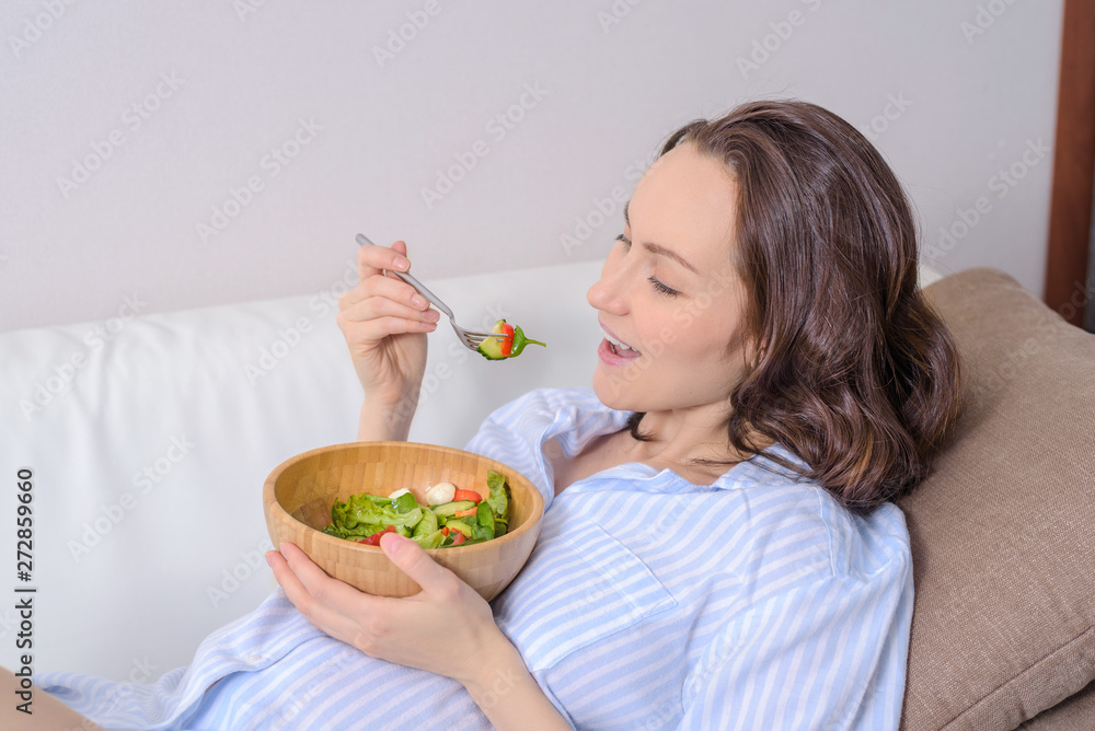 Portrait of pregnant woman with vegetable healthy salad Portrait of pregnant woman with vegetable healthy salad