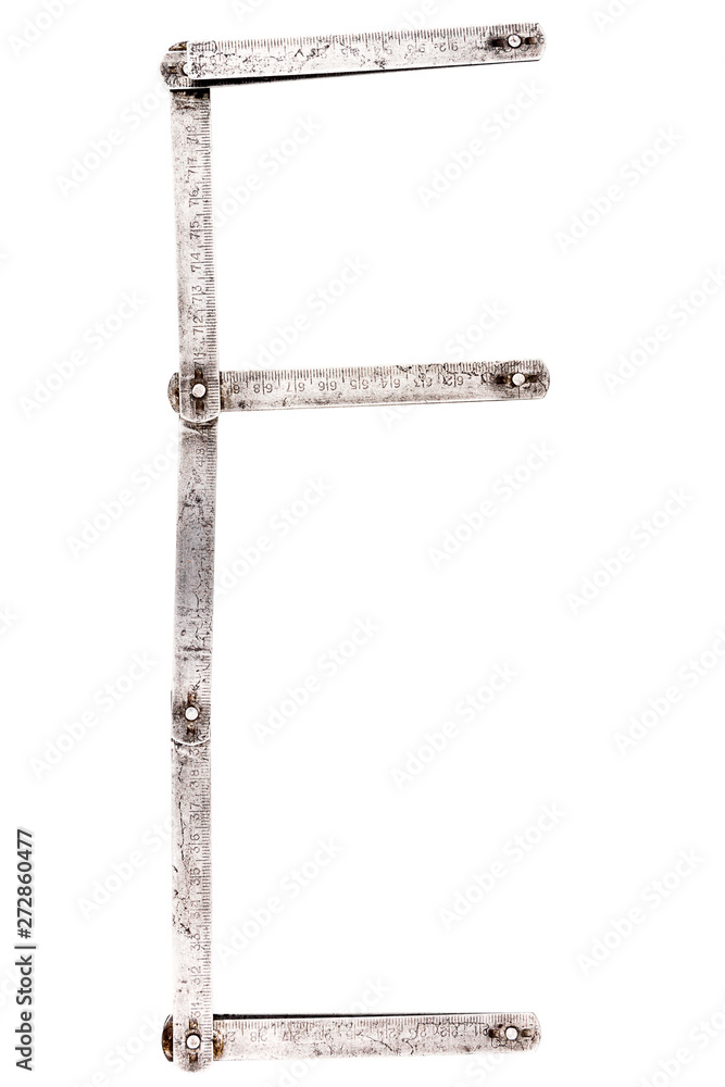 Old iron meter ruler letter E Old iron meter ruler letter E