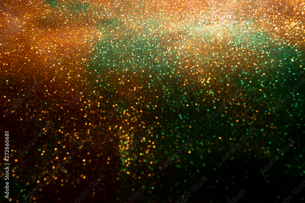 Glitter vintage lights background.Abstract Gold. Glitter wonderful lights background.
