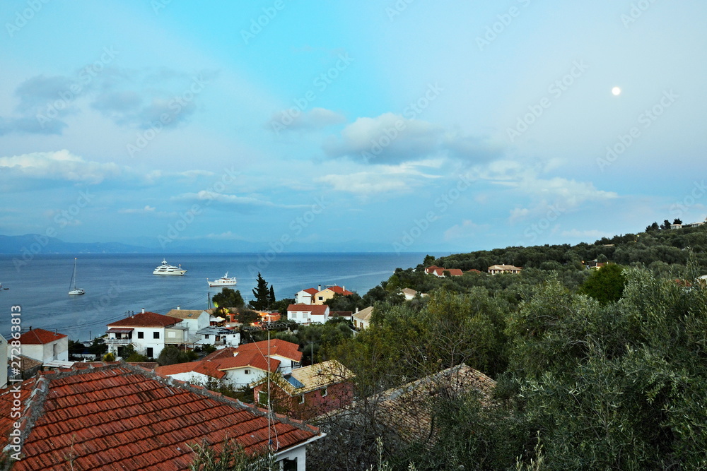 Greece,island Paxos-view on  the town Gaios and moon