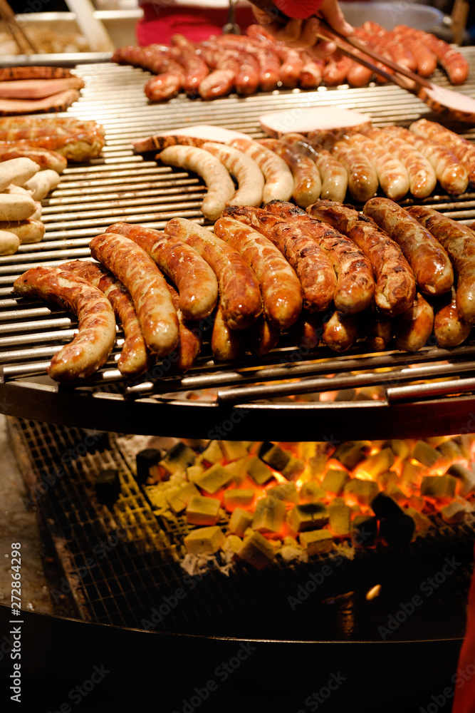 Large round barbecue of sausages and grilled meat