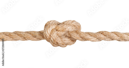 Overhand knot tied on thick jute rope isolated