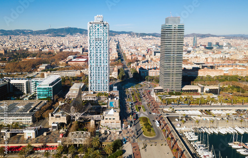 Cityscape of Barcelona with skyscrapers on embankment