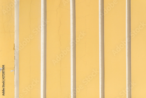 Vintage yellow building wall texture