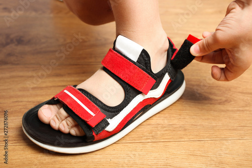 Stylish red sandals with velcro photo