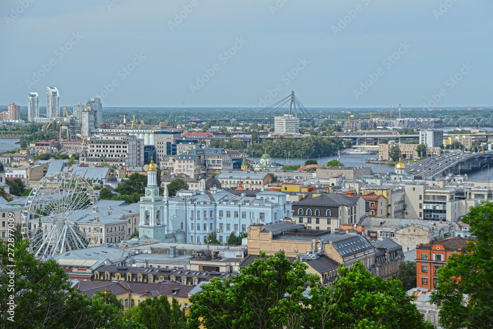 Kyiv cityscape with the Dnipro river. View on Podil district