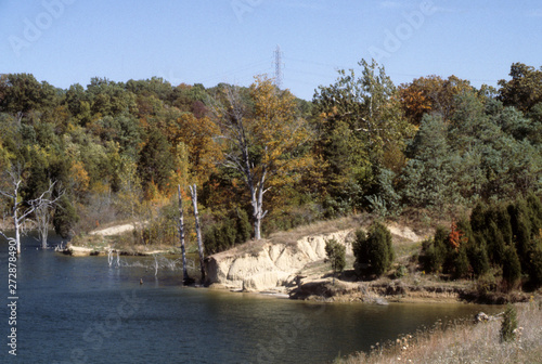Midwestern Lake under a bright blue sunny sky 