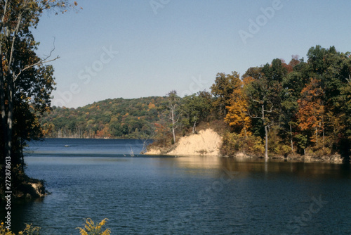 Midwestern Lake under a bright blue sunny sky 