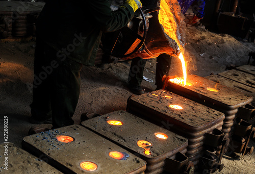 Making hot iron in foundry photo