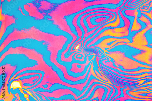Abstract trendy neon colored psychedelic fluorescent striped zebra textured background. © Aleksandra Konoplya
