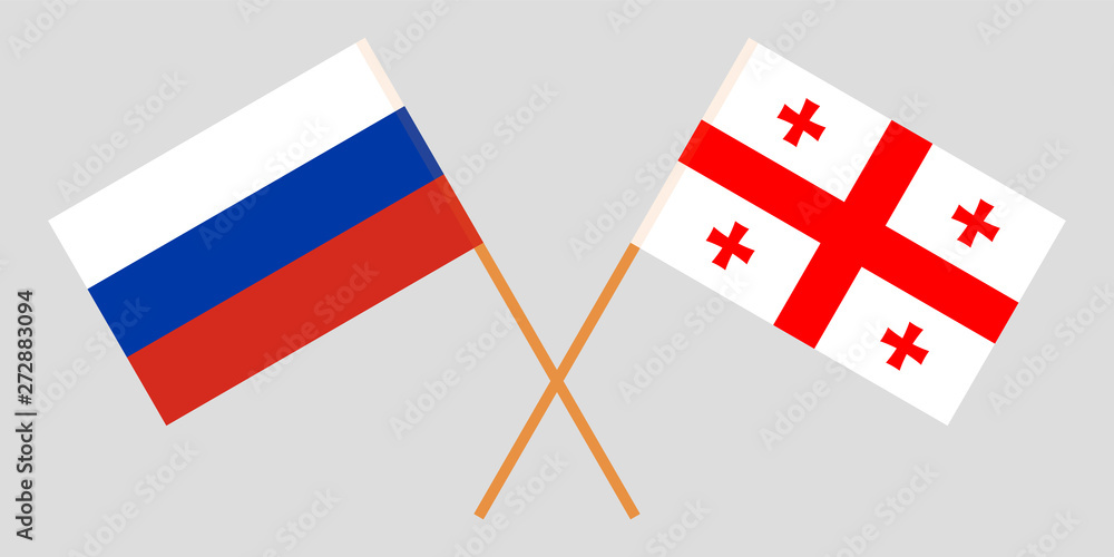 Georgia and Russia. Crossed Georgian and Russian flags