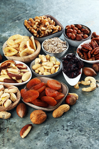 Fototapeta Naklejka Na Ścianę i Meble -  Composition with dried fruits and assorted healthy organic nuts