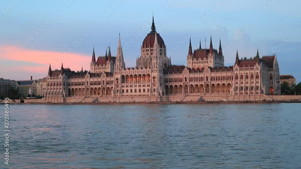 Beautiful evening view of the building of the Hungarian Parliament and the Danube River in Budapest, Hungary Beautiful evening view of the building of the Hungarian Parliament and the Danube River in Budapest, Hungary