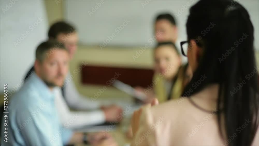Female Leader Manager Coach Talking To Employees Group Gathered At Corporate Meeting Presenting Report New Business Plan. Diverse Team Company Staff Listen To Boss At Office Briefing. Female Leader Manager Coach Talking To Employees Group Gathered At Corporate Meeting Presenting Report New Business Plan. Diverse Team Company Staff Listen To Boss At Office Briefing.
