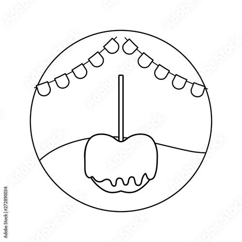 delicious candy apple with garlands in frame circular