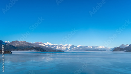 Glacier Bay National Park  Alaska. Spectacular sweeping vista of ice capped  snow covered mountains  glaciers  wildlife landscape. Absolutely breathtaking natural untouched serene nature views.