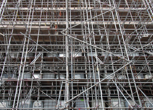 Wallpaper Mural scaffolding on a construction siteshowing ibc water filled intermediate bulk containers used as ballast on each level Torontodigital.ca