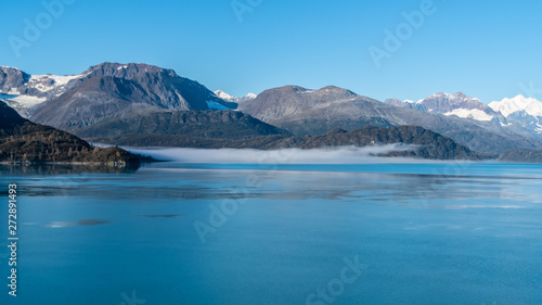 Glacier Bay National Park  Alaska. Spectacular sweeping vista of ice capped  snow covered mountains  glaciers  wildlife landscape. Absolutely breathtaking natural untouched serene nature views.