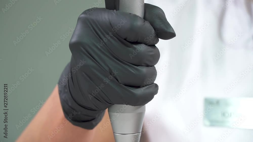 Removal of an old tattoo with a laser in an aesthetic medicine clinic. Removal of an old tattoo with a laser in an aesthetic medicine clinic.