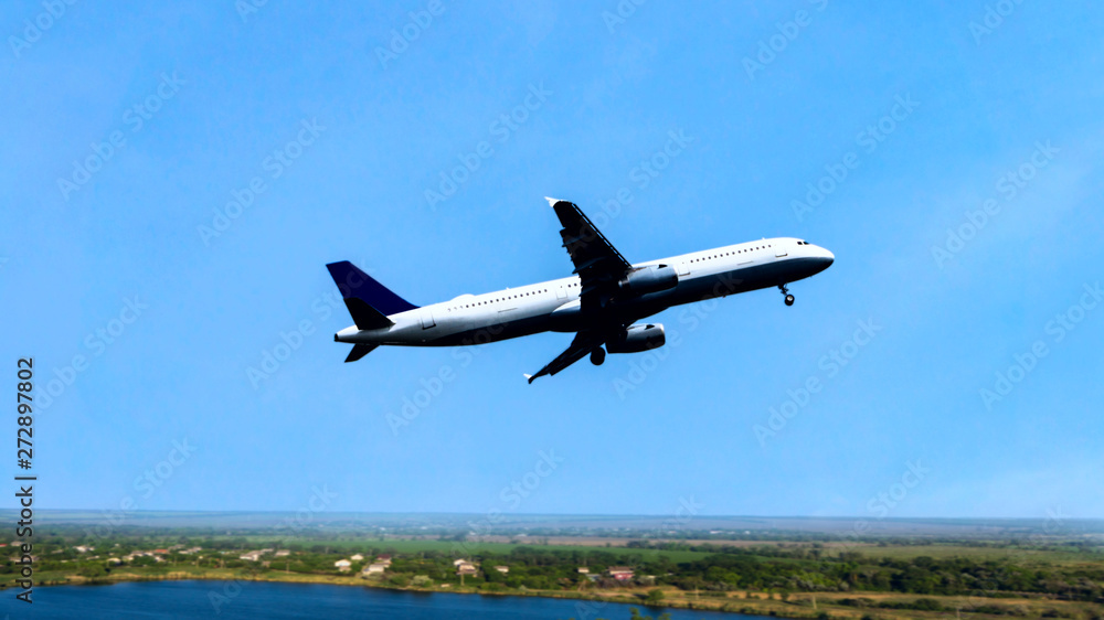 Airplane in the sky at sunrise . Plane Background Blue Sky White Clouds Airplane in the sky at sunrise . Plane Background Blue Sky White Clouds