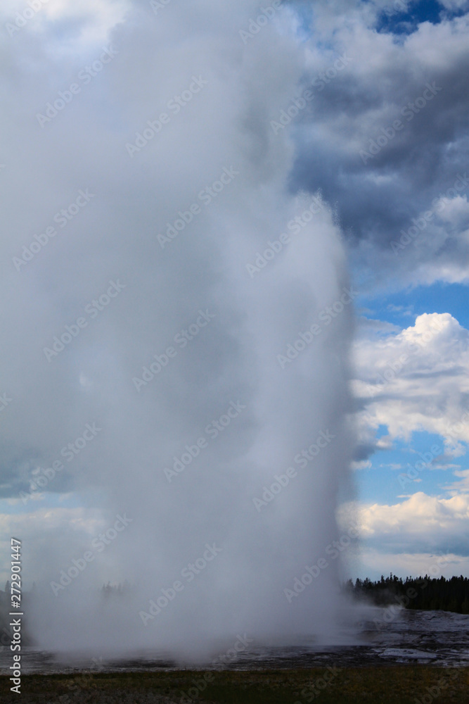 Geyser erupting in the Upper Geyser Basin of Yellowstone National Park, Wyoming