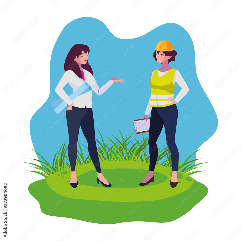 female builder and engineer woman on the lawn female builder and engineer woman on the lawn