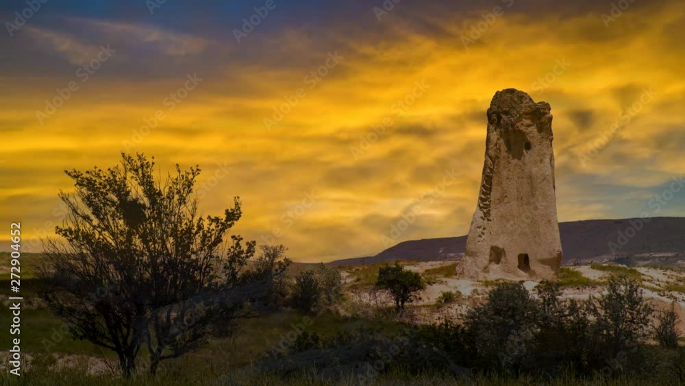Cinemagraph of sunset clouds and sky behind Cappadocia Turkey ruins in the desert. Cinemagraph of sunset clouds and sky behind Cappadocia Turkey ruins in the desert.