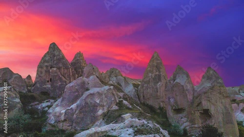 Cinemagraph of Cappadocia Turkey with sky time lapse at sunset behind ruins.