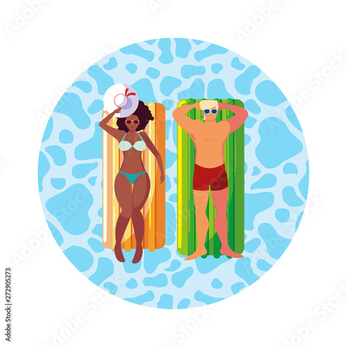 interracial couple with float mattress in water