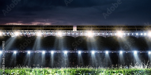 Football stadium background with flying ball