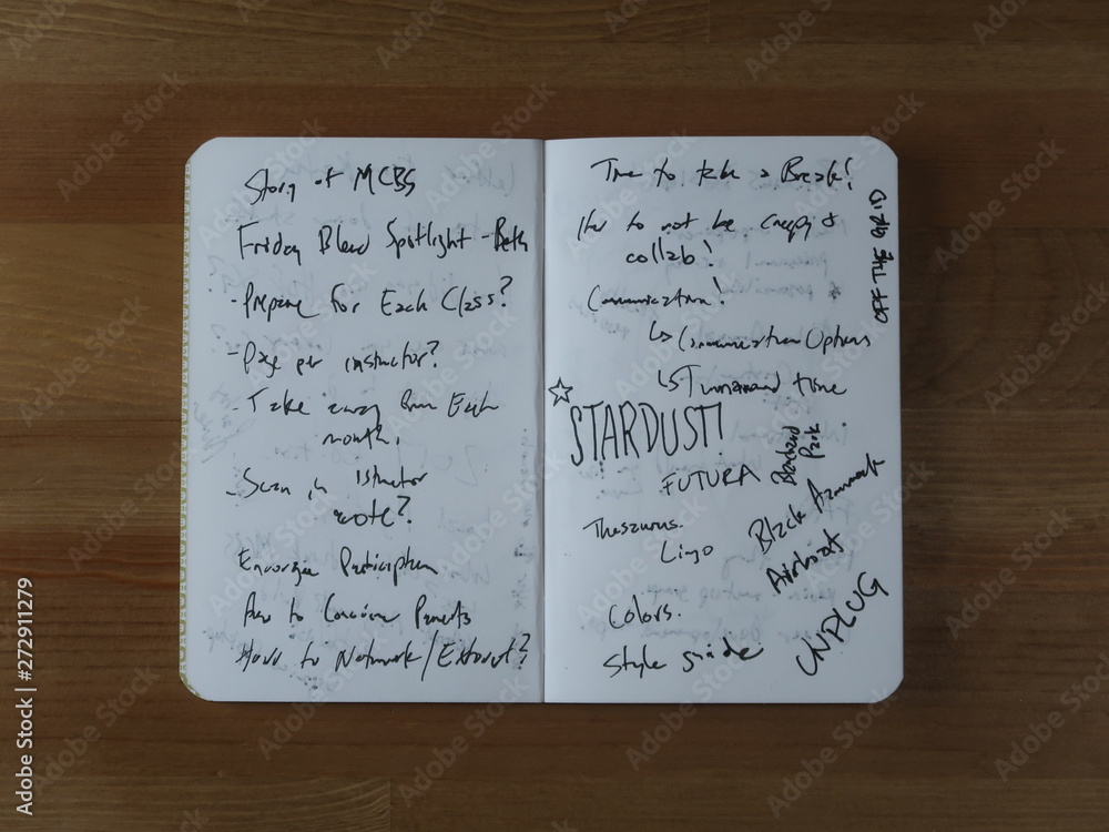 Fototapeta premium Handwritten Notebook on Wooden Table
