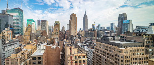 Panoramic view of Manhattan skyscrapers, New York city, cloudy spring day
