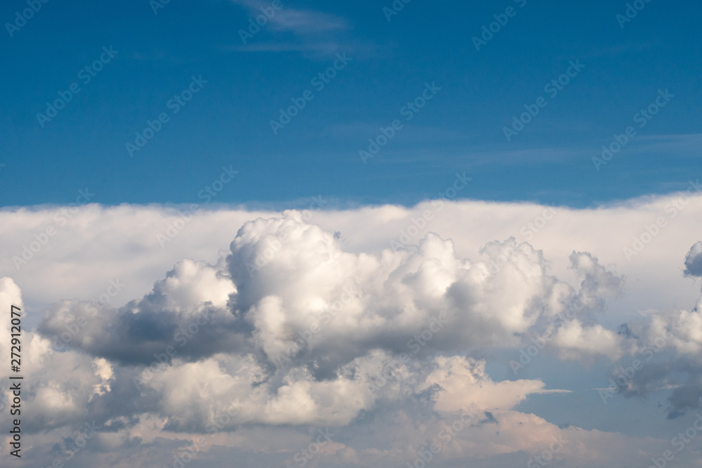 Fluffy clouds of the sky