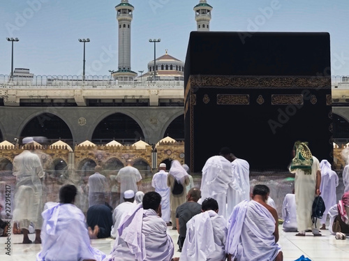 Motion blur of Muslim pilgrims circumambulate the Kaaba counter-clockwise at Masjidil Haram in Makkah, Saudi Arabia. photo