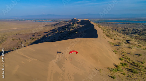 paraglider on the background of sand dune  top view