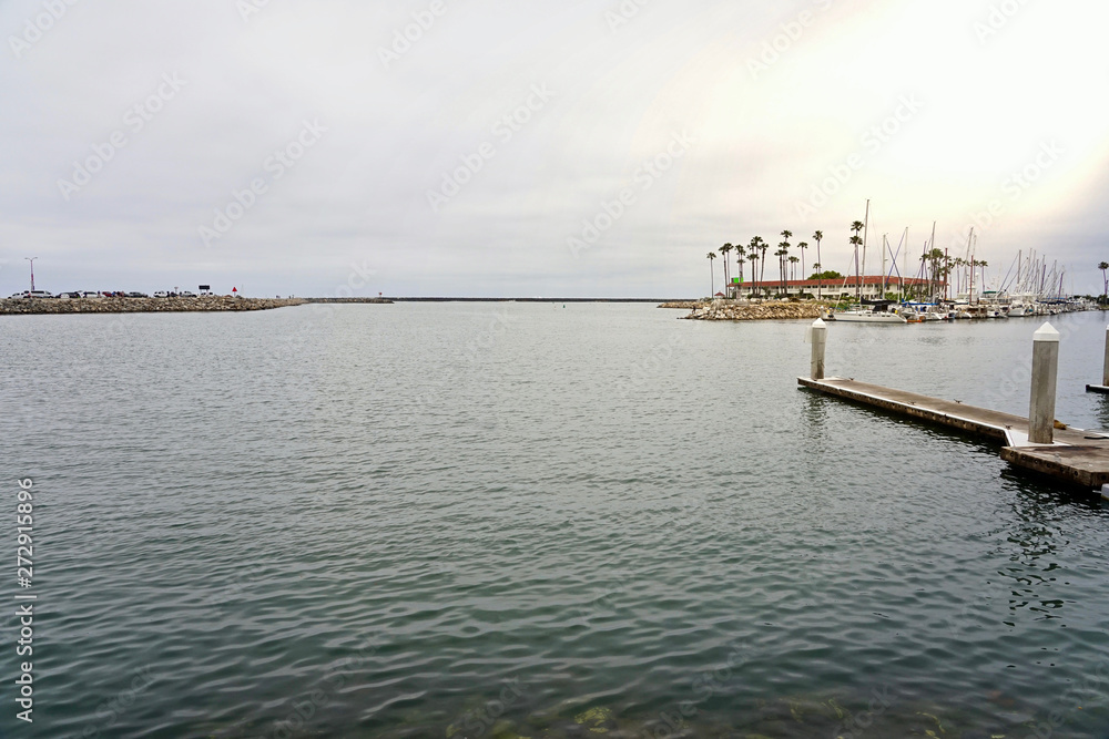 OCEANSIDE, CALIFORNIA - 1 JUNE 2019: Oceanside Harbor and Beaches and seal sleeping on dock.