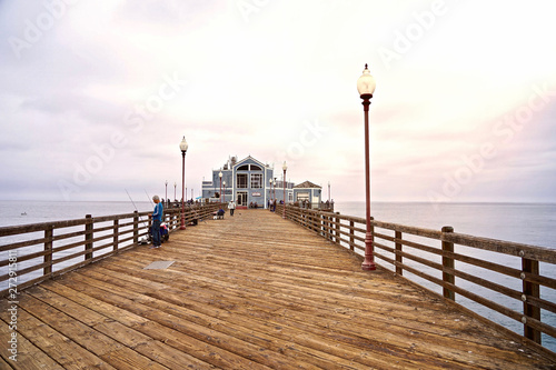 OCEANSIDE, CALIFORNIA - 2 JUNE 2019: Oceanside sea view and pier bridge playground and surfboard 