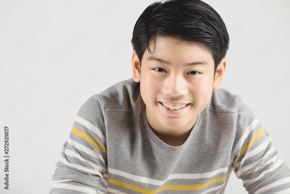 Photo of asian young happy boy looking at camera. Photo of asian young happy boy looking at camera.