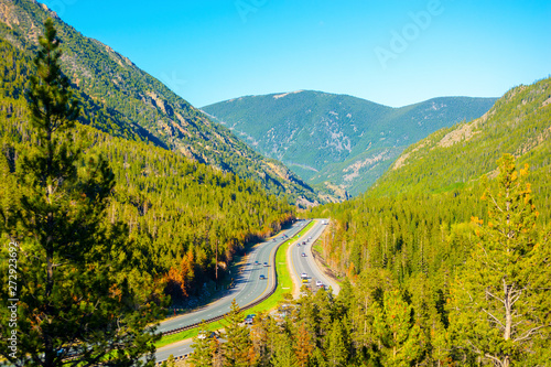 Interstate 70 (I-70) in the Rocky Mountains of Colorado on a Sunny Day photo