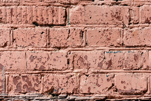 Old brick wall brown color painted texture close up. Abstract background 