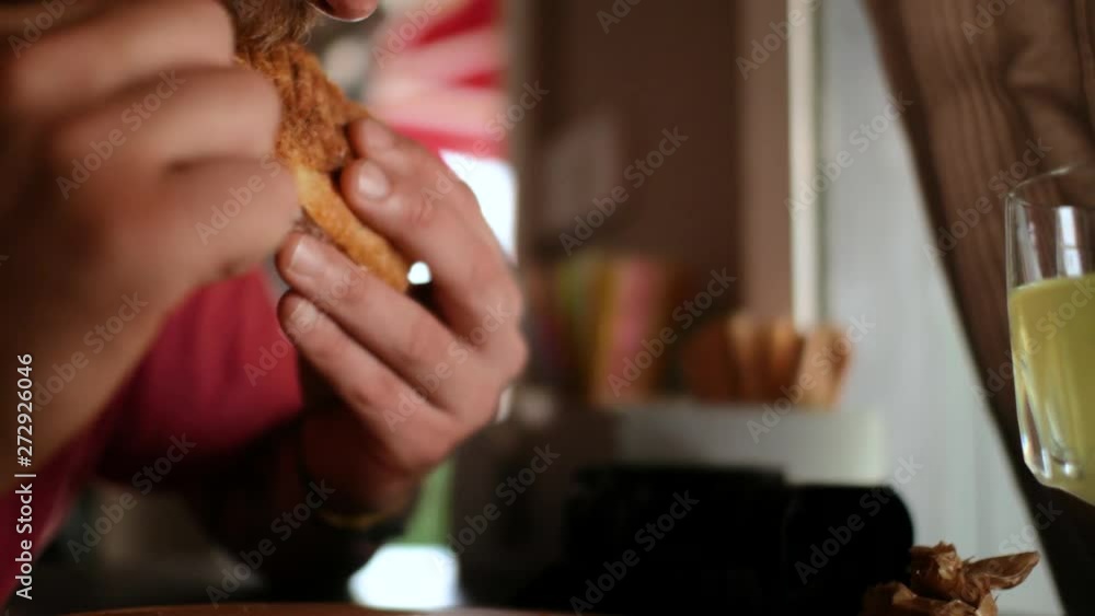 sandwich (burger) closeup in the hands of a man, then he bites the sandwich. 4k. 4k video sandwich (burger) closeup in the hands of a man, then he bites the sandwich. 4k. 4k video